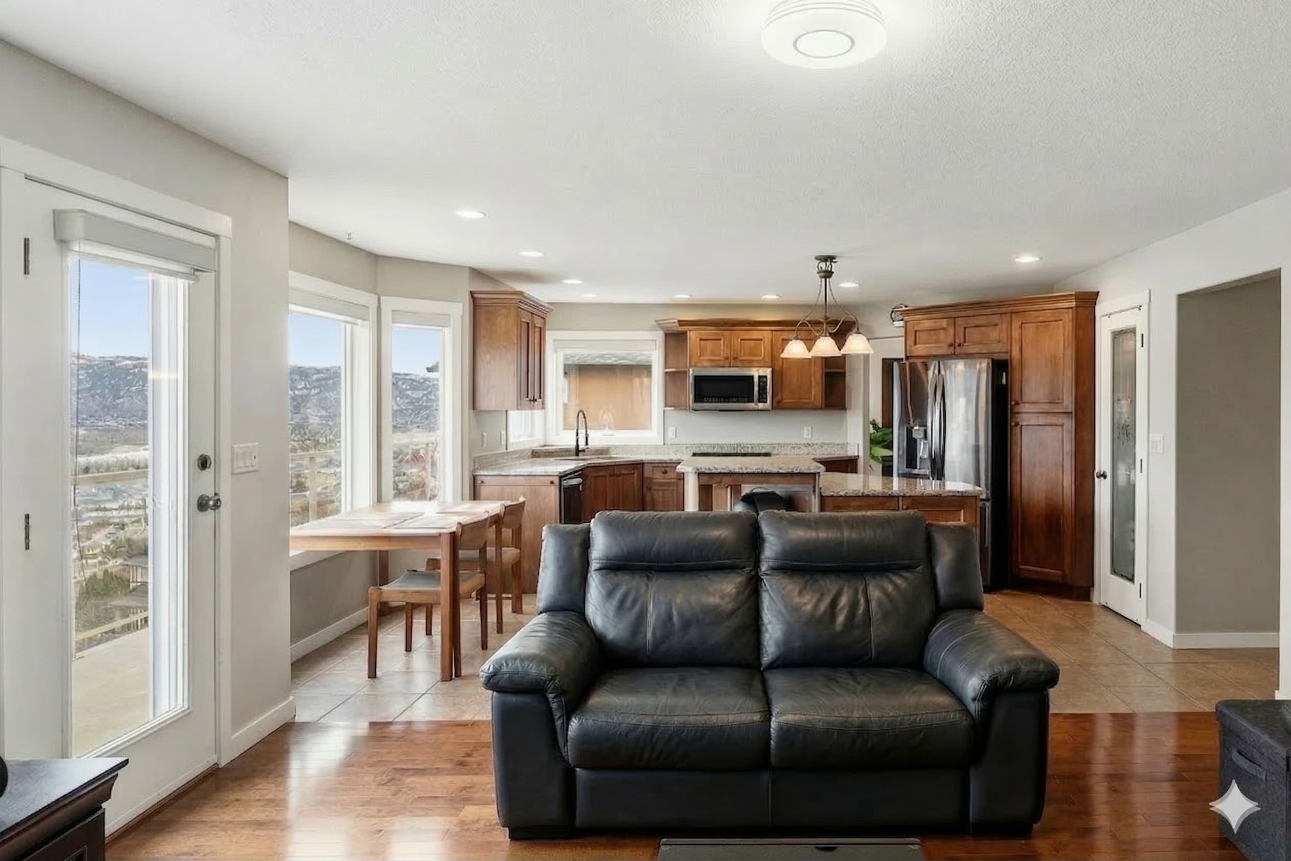 Open concept kitchen and family room with panoramic mountain views