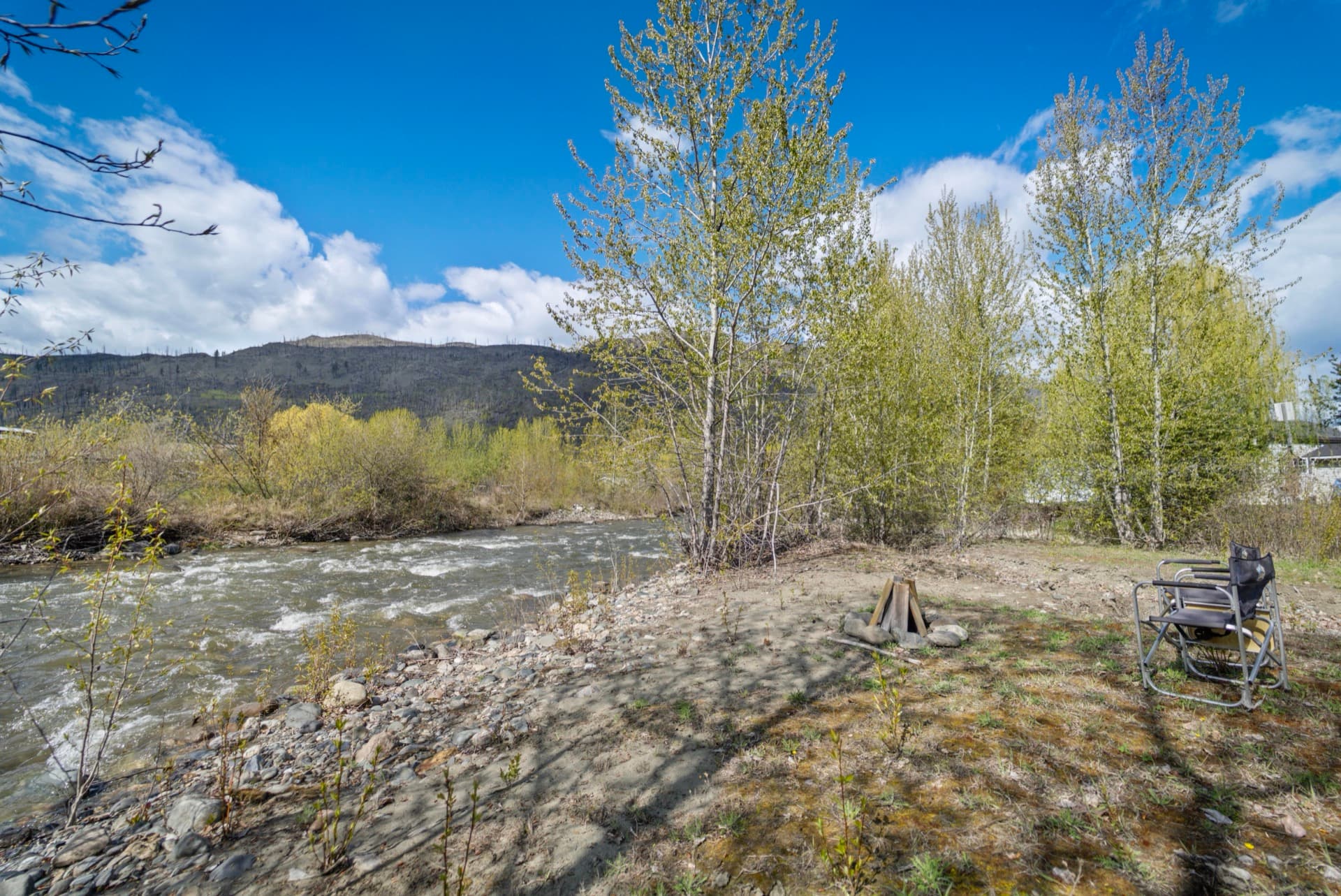 Louis Creek waterfront with mountain views
