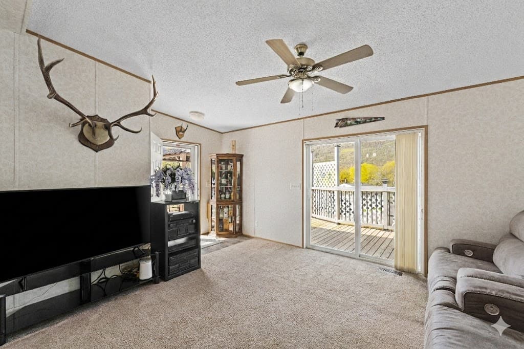 Spacious living room with deck access