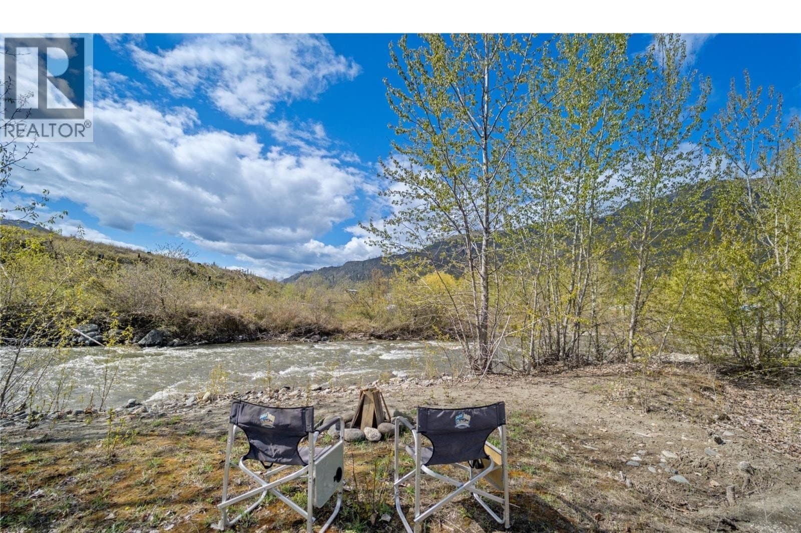 Creek frontage with mountain views